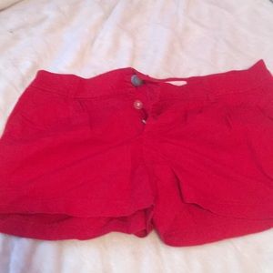 red shorts